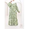 Long green dress with print 
